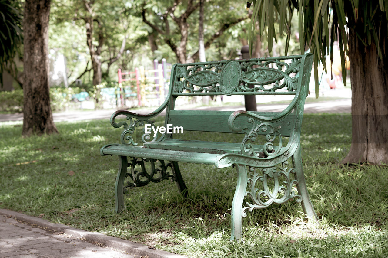 Empty bench in park