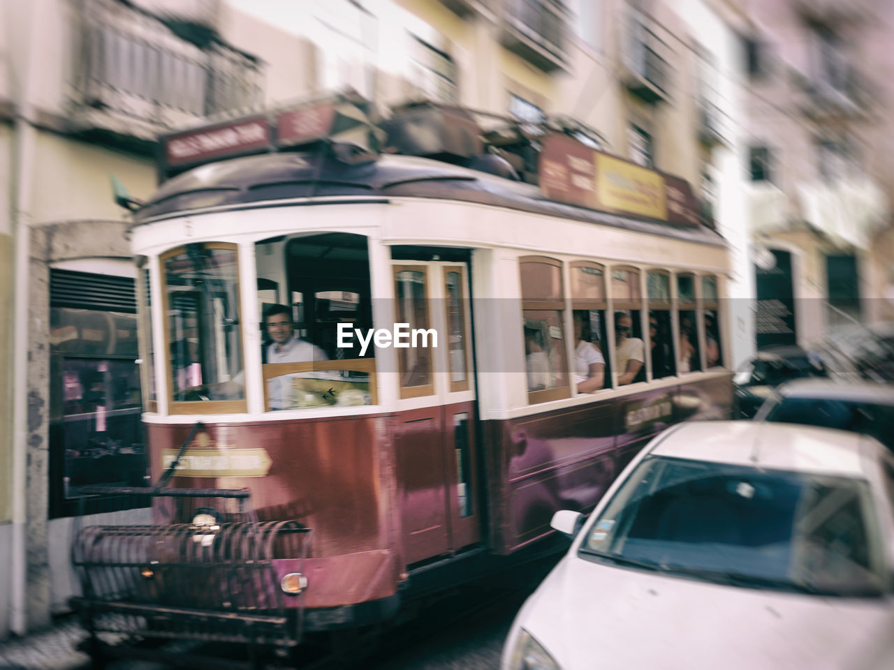 CLOSE-UP OF CAR ON BUS