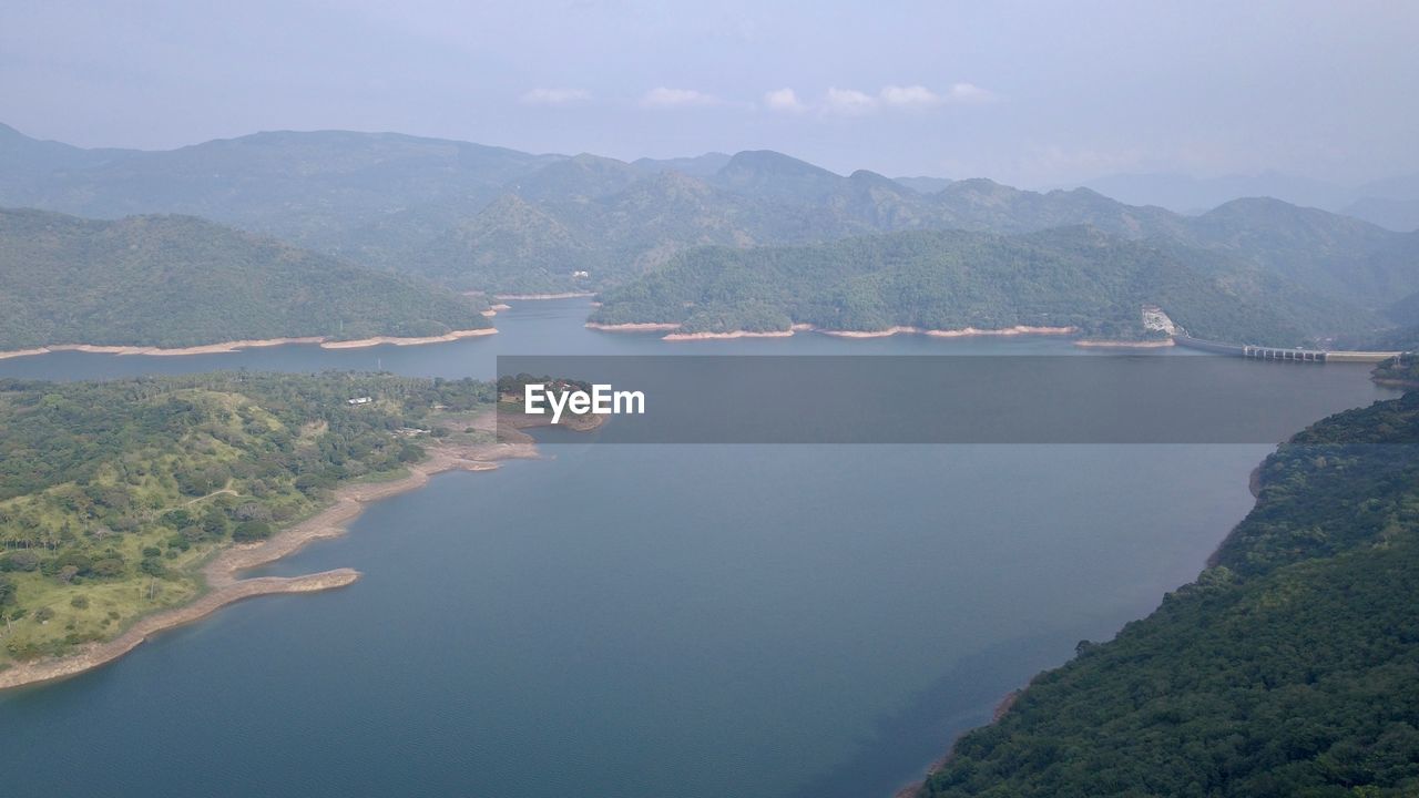 High angle view of bay against sky