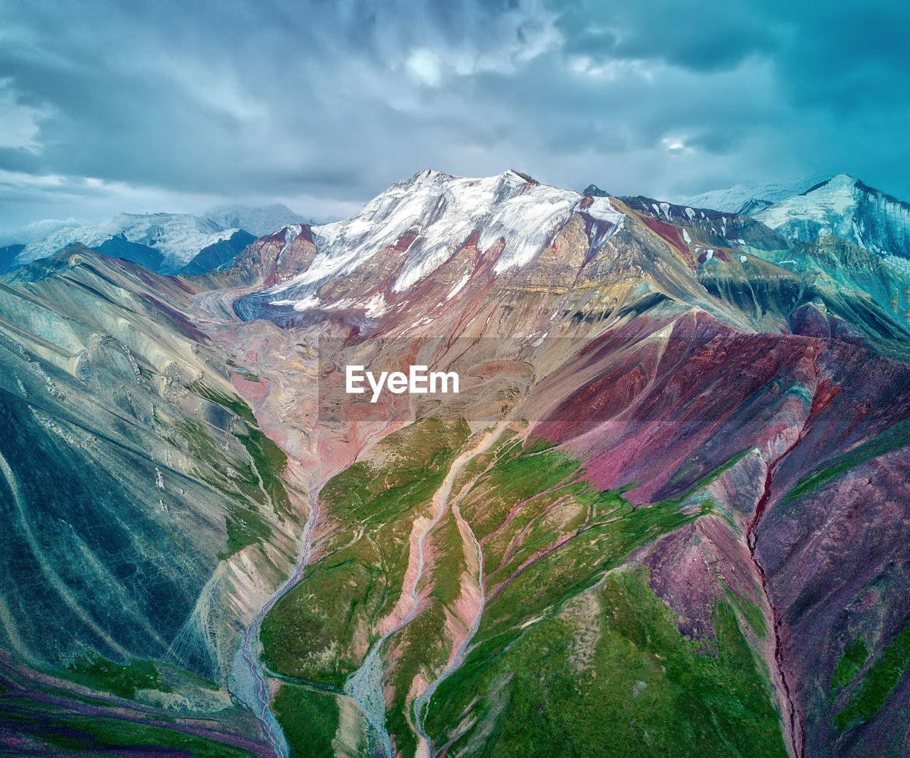 View of mountain range against cloudy sky