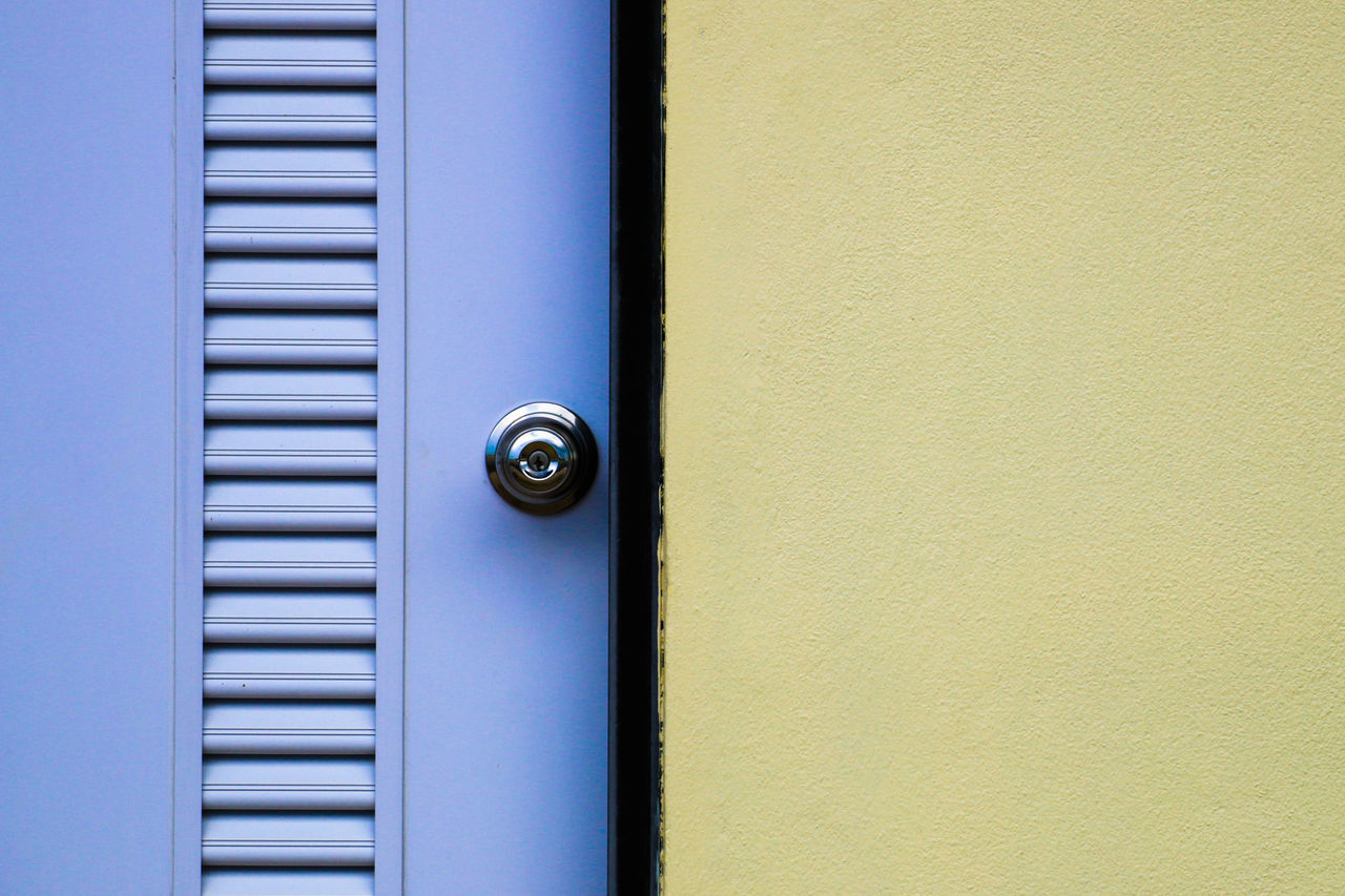 CLOSE-UP OF CLOSED DOOR ON BUILDING