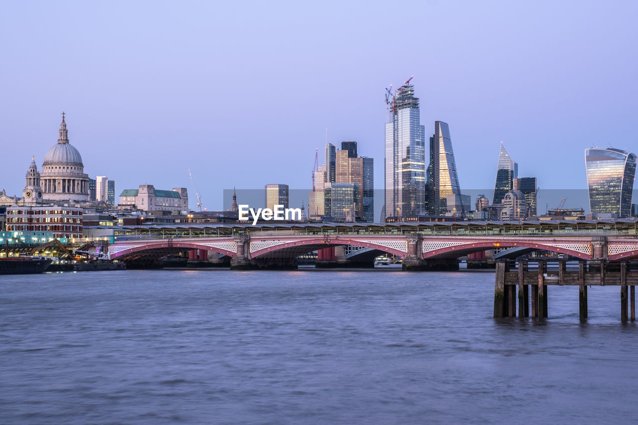 VIEW OF BRIDGE AND BUILDINGS IN CITY