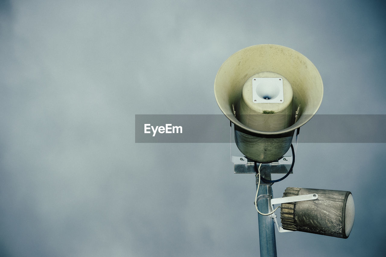 Close-up of megaphone against sky