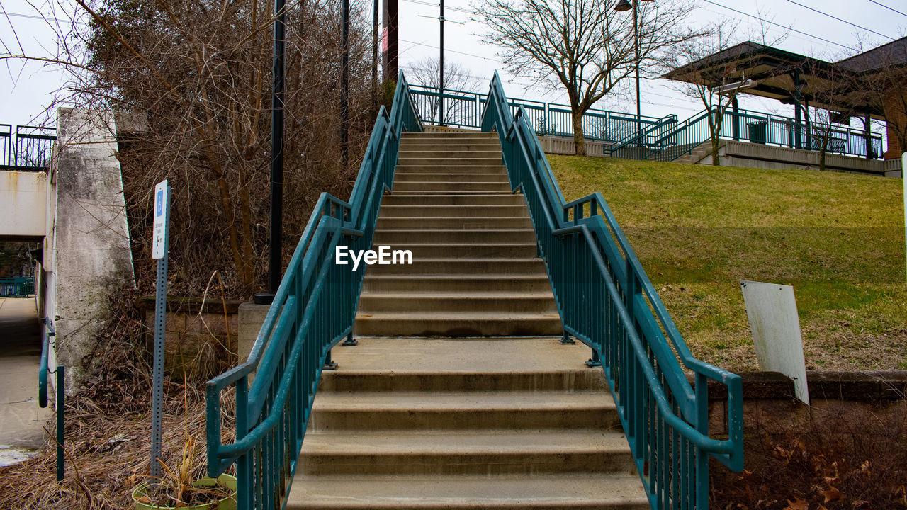 LOW ANGLE VIEW OF STAIRCASE BY BUILDING