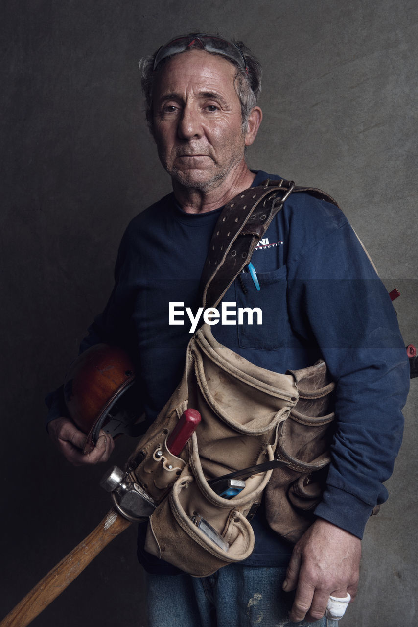 Construction worker with tool belt