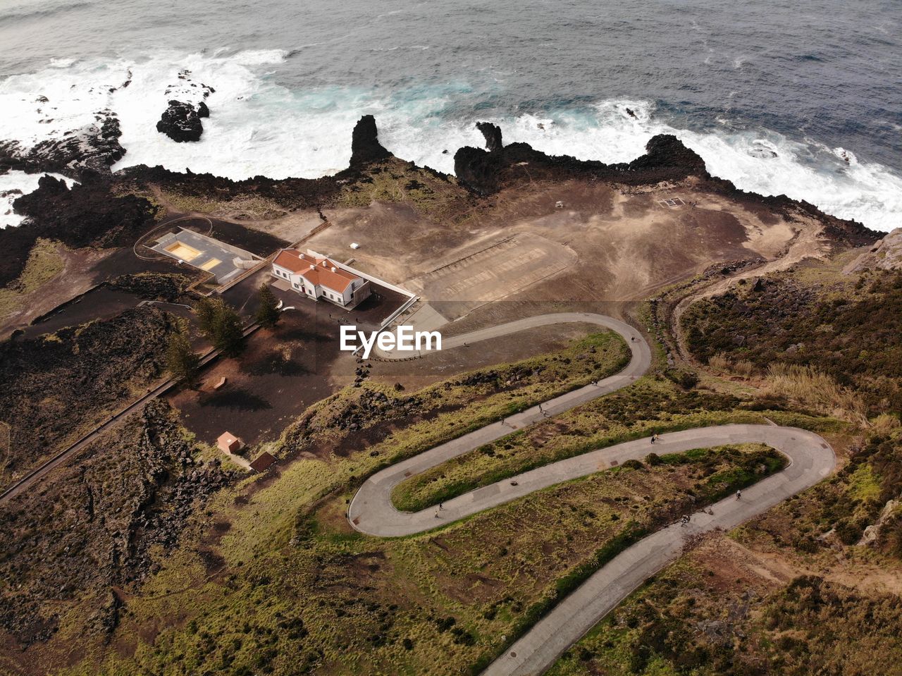 High angle view of road by sea