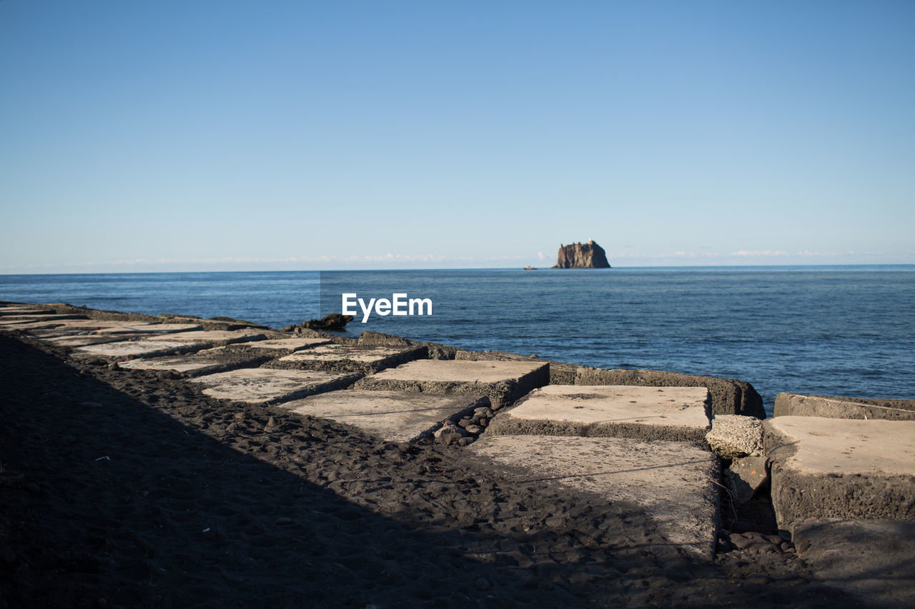 Scenic view of sea against clear sky