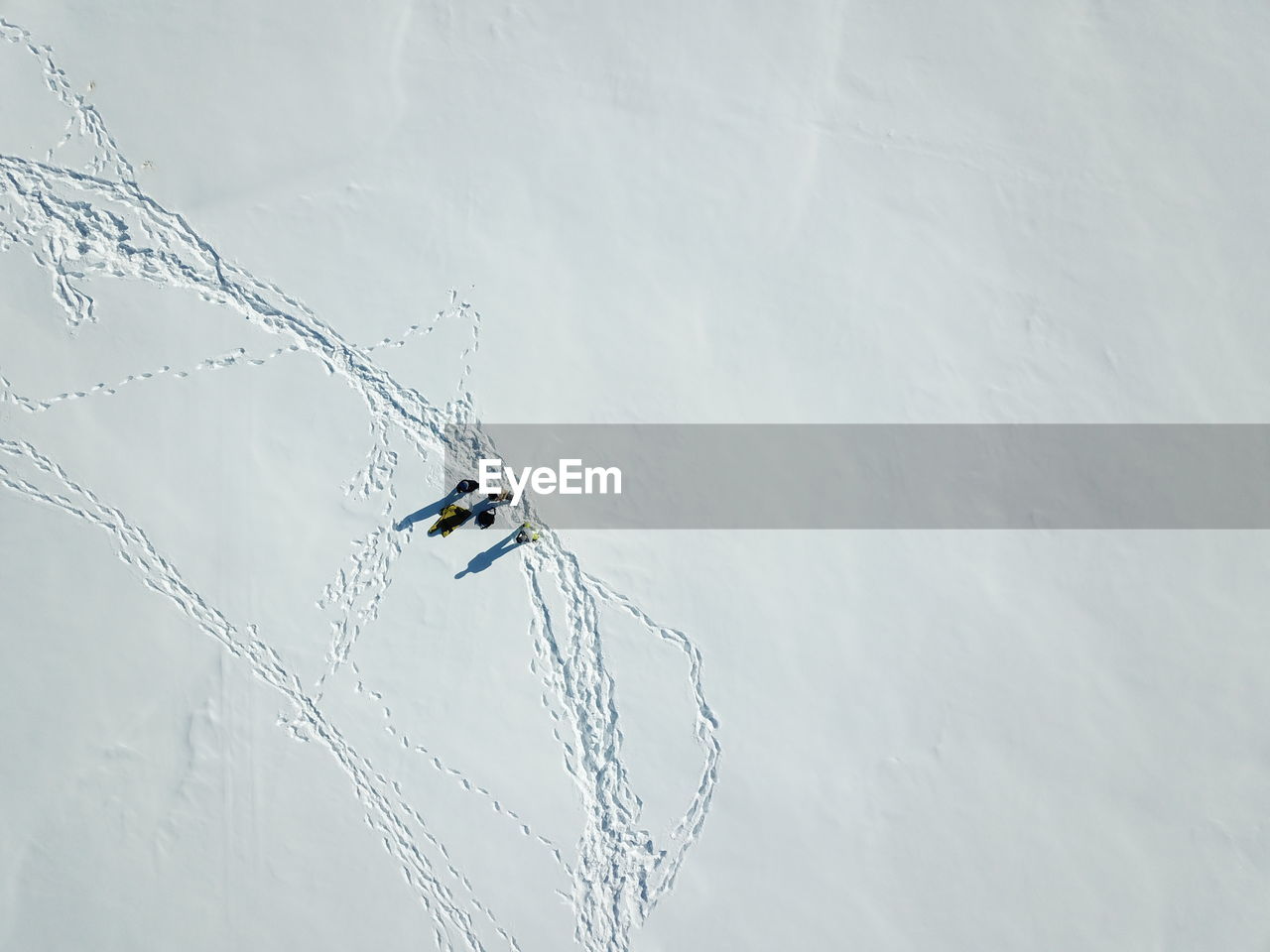 HIGH ANGLE VIEW OF SNOW ON LAND