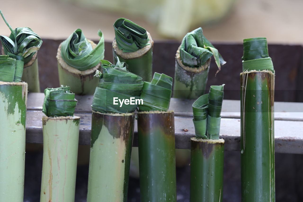 CLOSE-UP OF FOOD ON BAMBOO