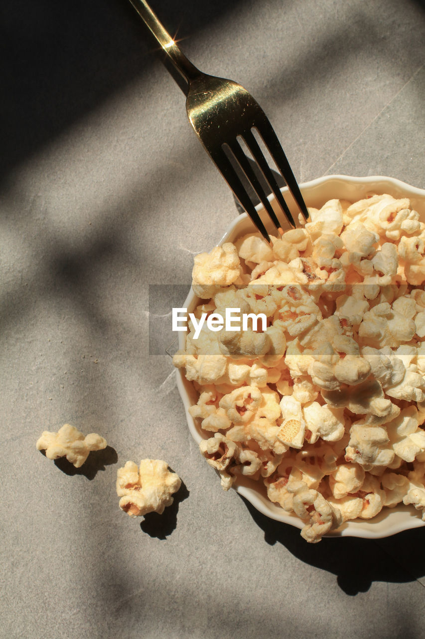 food, food and drink, snack, kitchen utensil, kettle corn, eating utensil, indoors, popcorn, freshness, healthy eating, produce, wellbeing, high angle view, meal, dish, no people, spoon, sweet food, studio shot, dessert, still life, breakfast, bowl, table, close-up