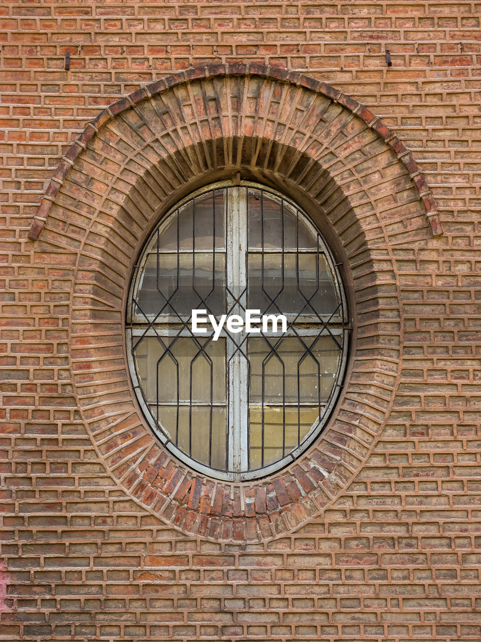 Window on brick wall of building