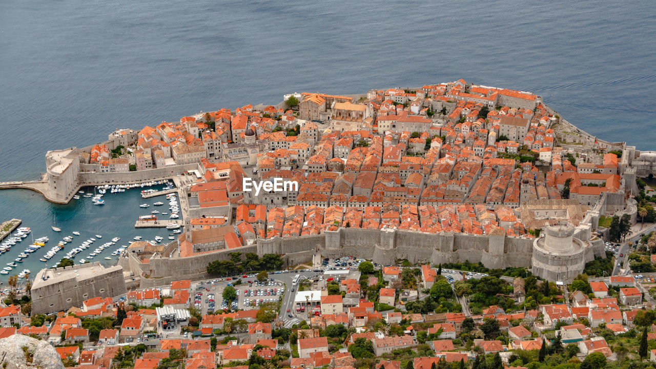 High angle view of town by sea