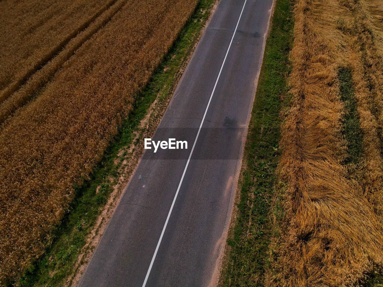 High angle view of road amidst field