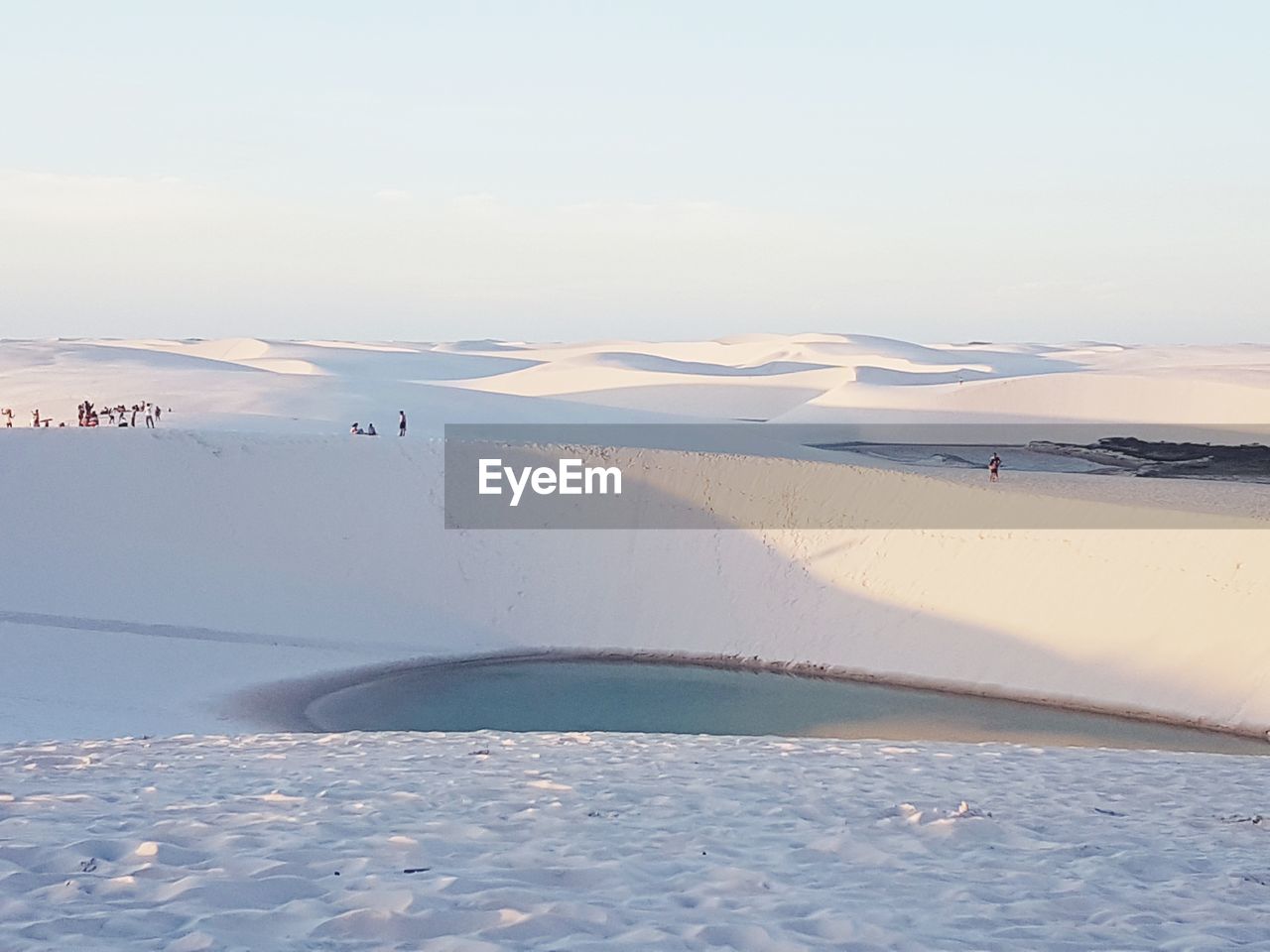 Scenic view of snow covered landscape against sky