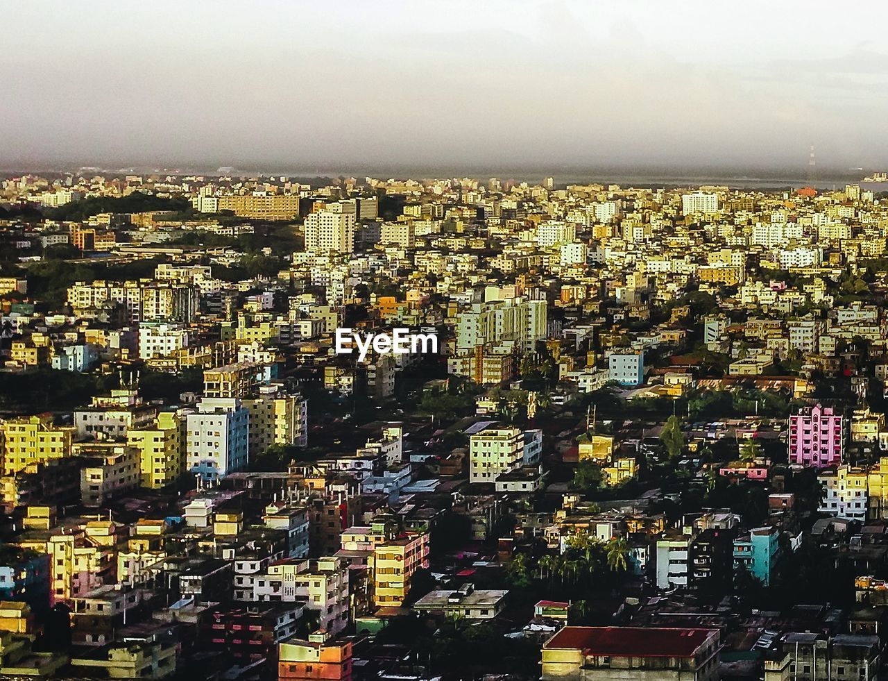 Aerial view of cityscape against sky