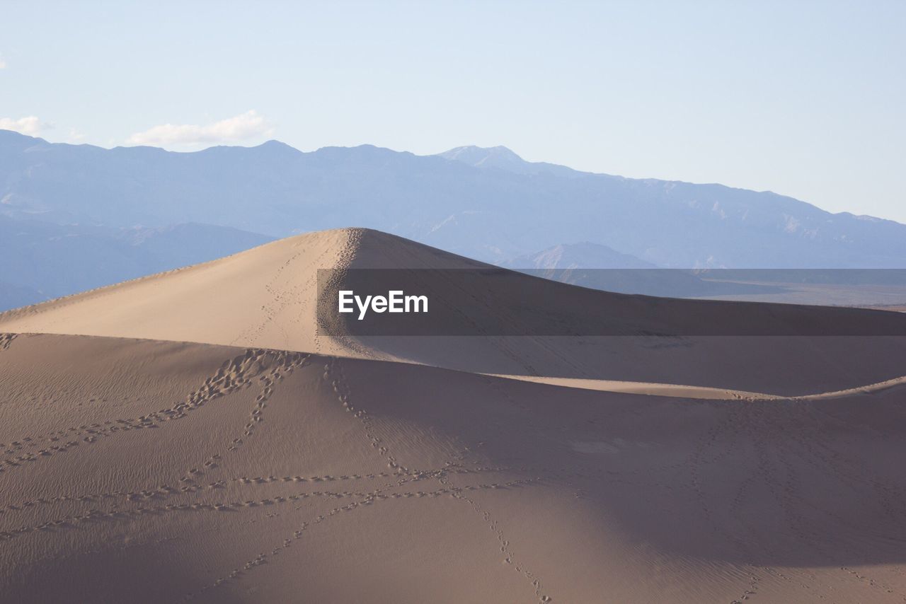 Scenic view of desert against sky