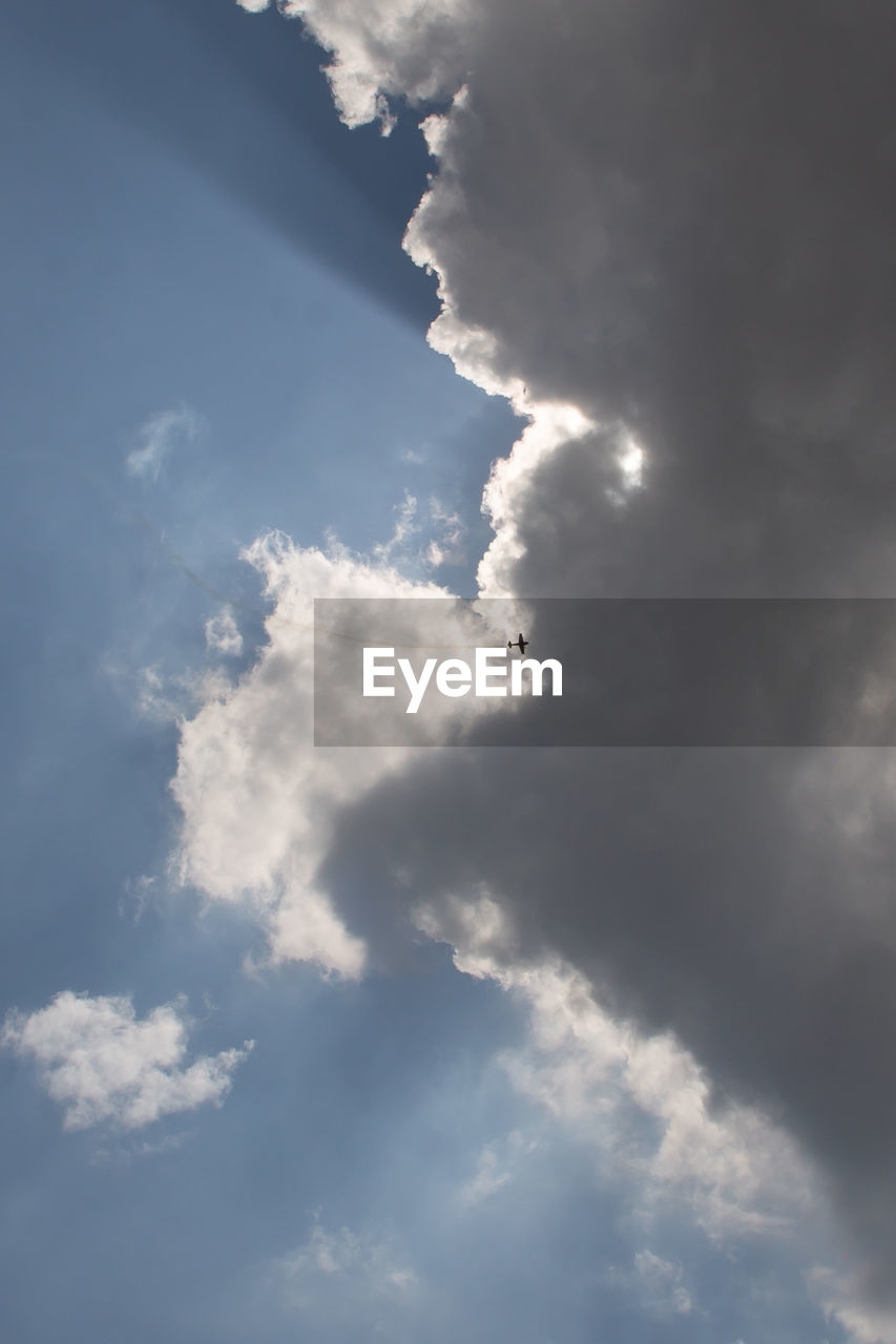 LOW ANGLE VIEW OF CLOUDS IN BLUE SKY