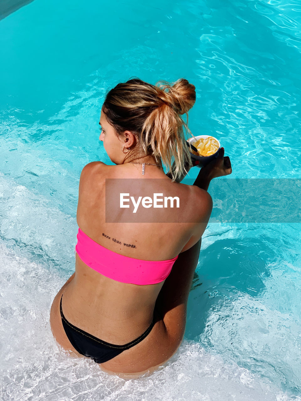 water, women, clothing, one person, adult, rear view, swimming pool, swimwear, swimming, bikini, leisure activity, lifestyles, young adult, nature, vacation, summer, high angle view, trip, holiday, female, hairstyle, relaxation, day, sports, wellbeing, outdoors, long hair, sunlight, three quarter length, wet, back, sea