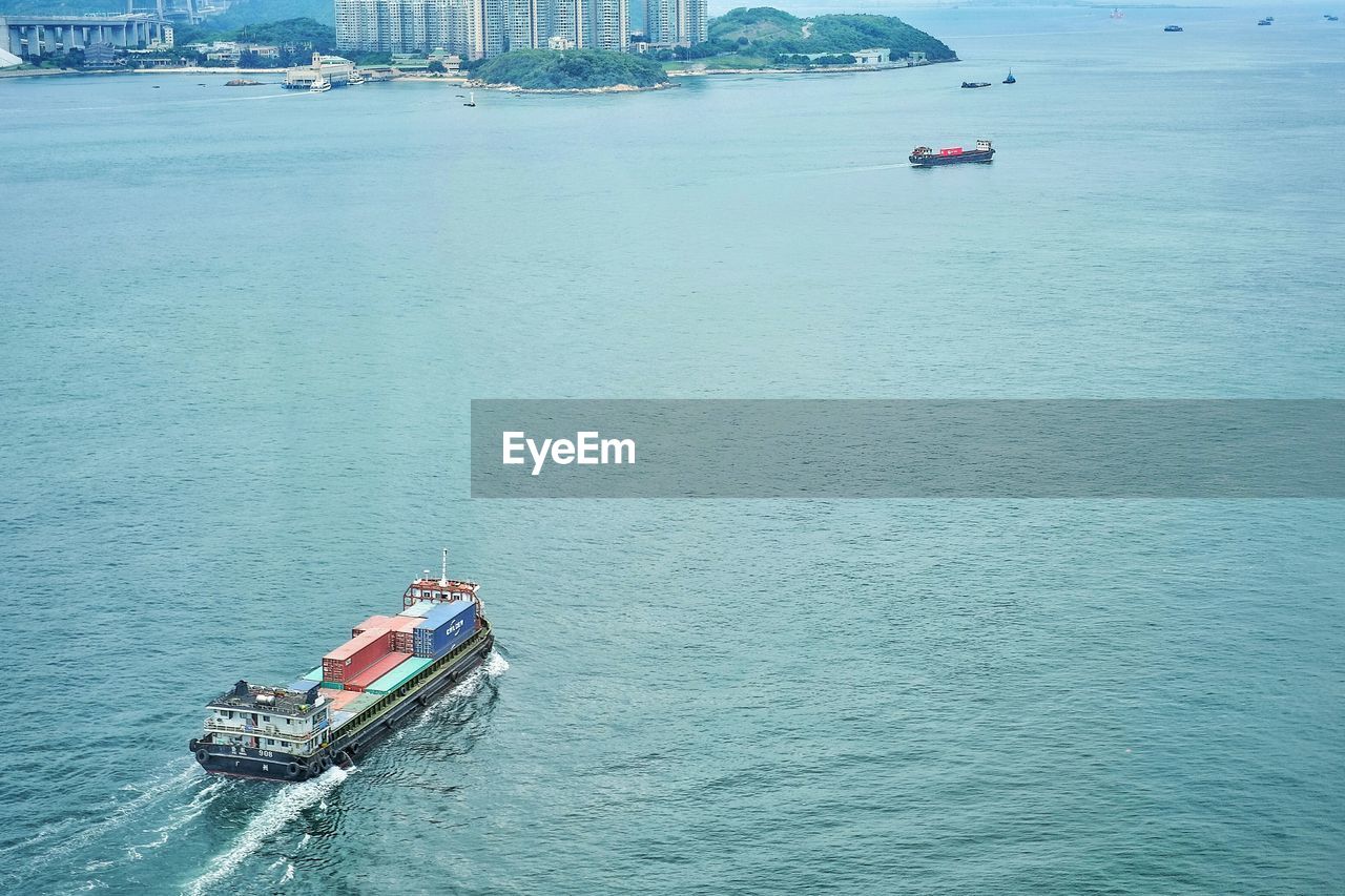 High angle view of ship sailing in sea