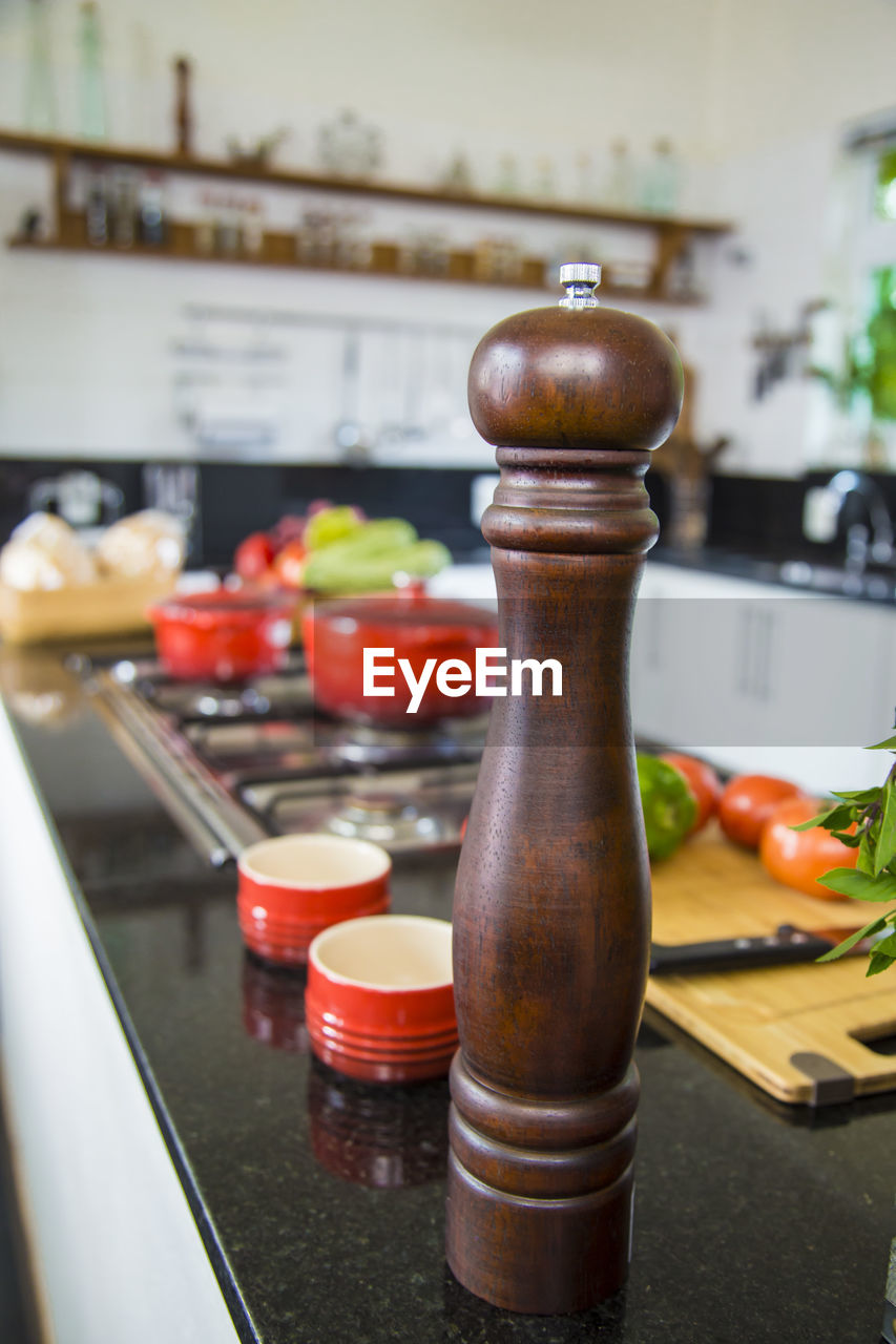 Pepper mill on counter in kitchen at home