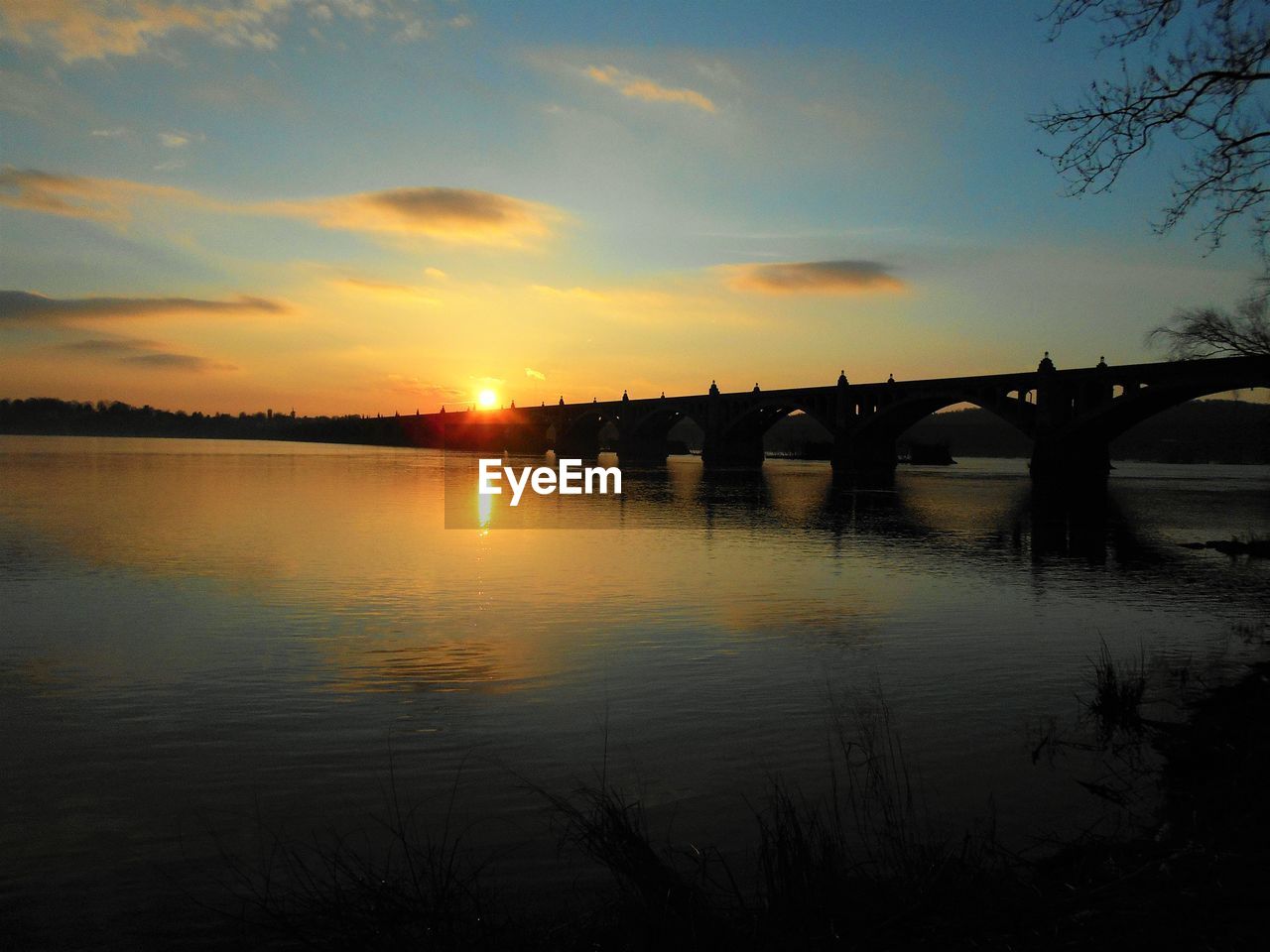 Scenic view of sunset over river