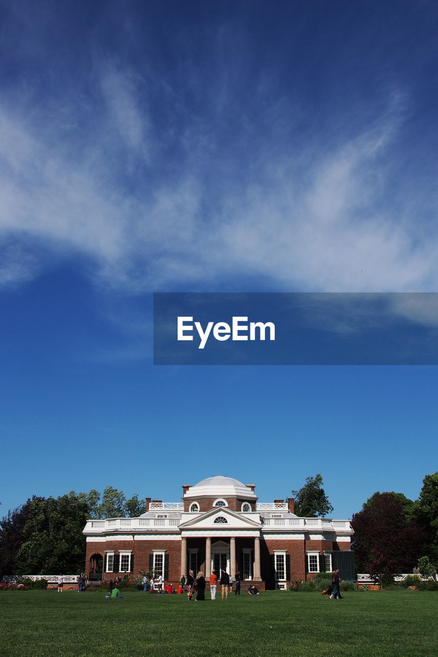 VIEW OF BUILT STRUCTURE AGAINST BLUE SKY