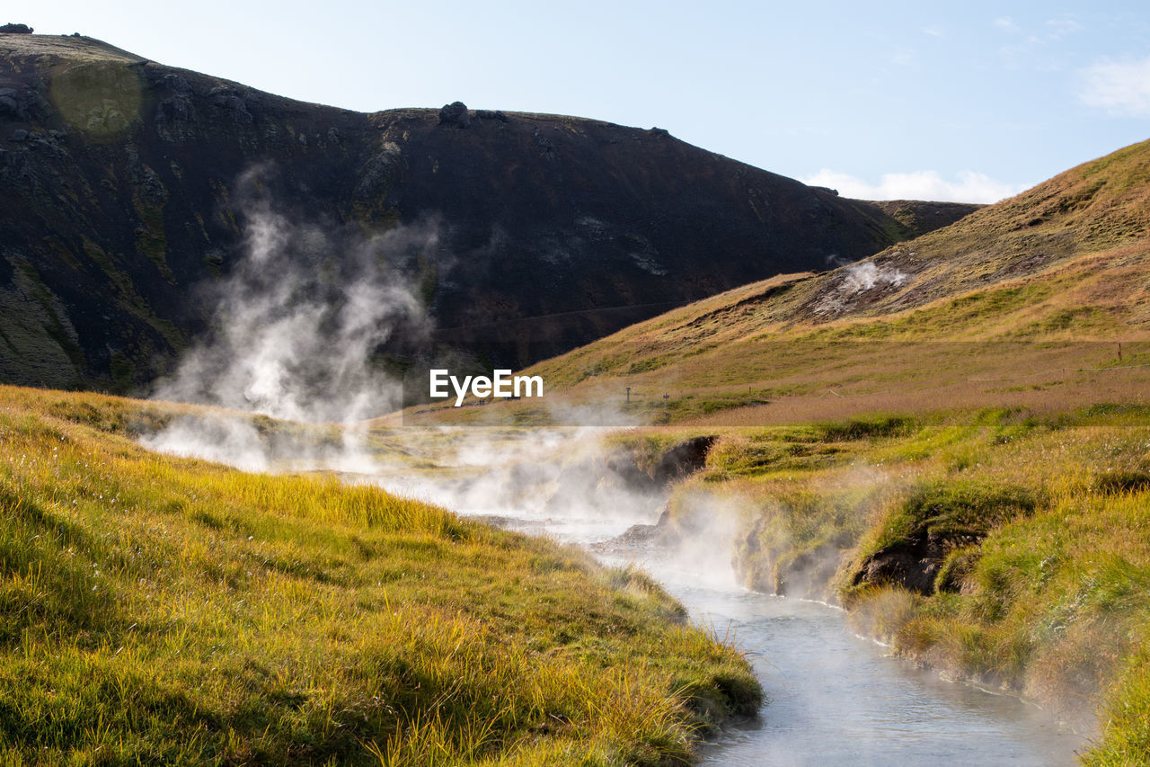 Boiling hot creek in mountain landscape