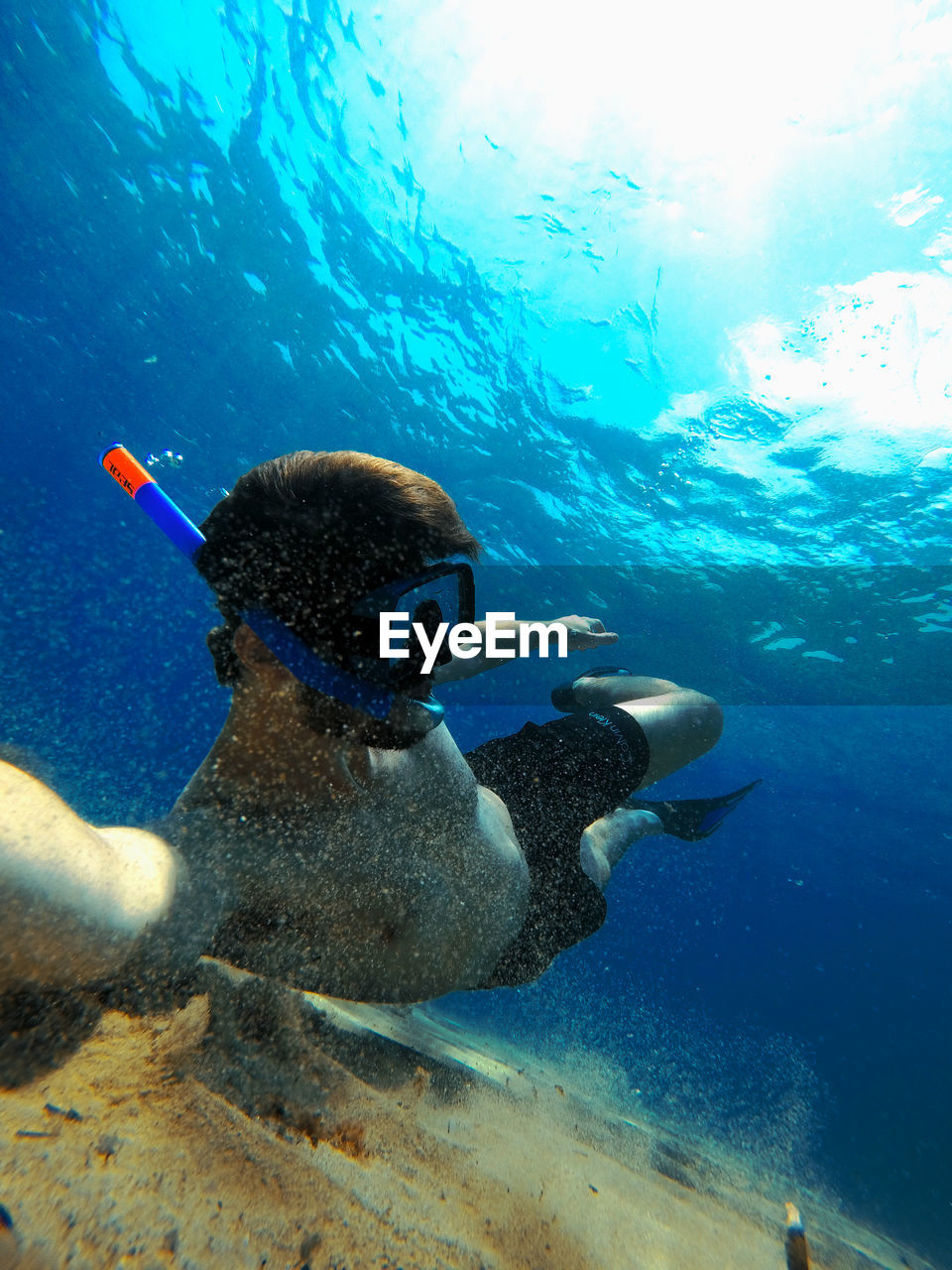 Man scuba diving in sea