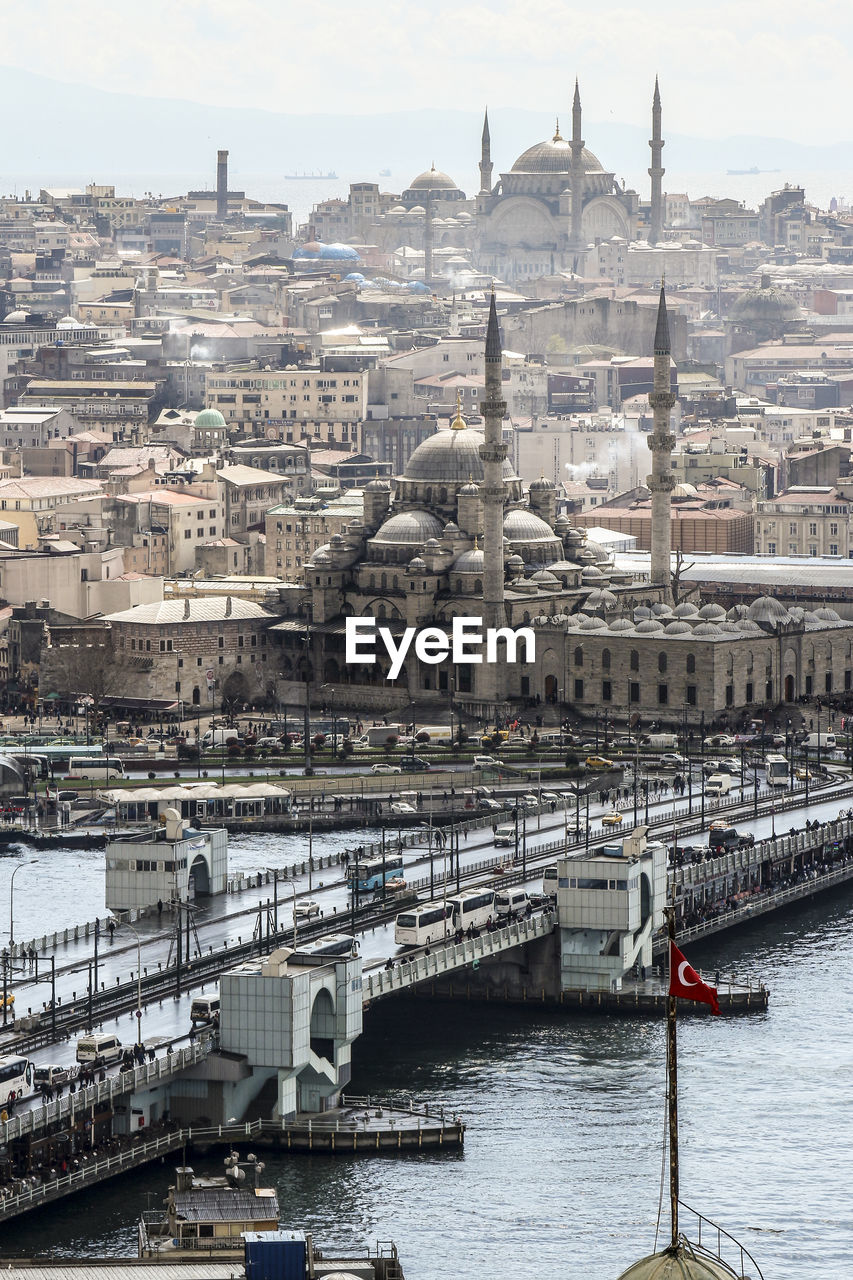 Galata bridge over sea by new mosque and city