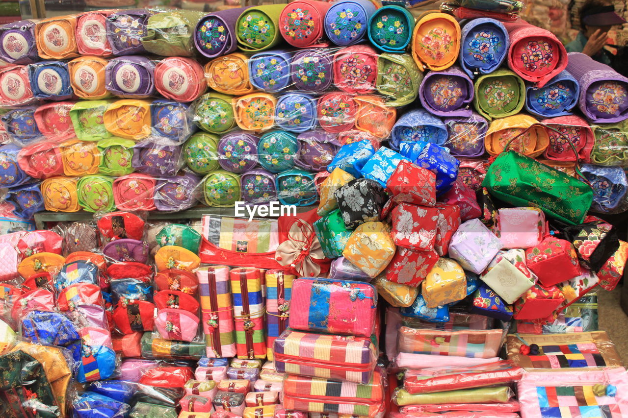 Full frame shot of various pouches for sale at market stall