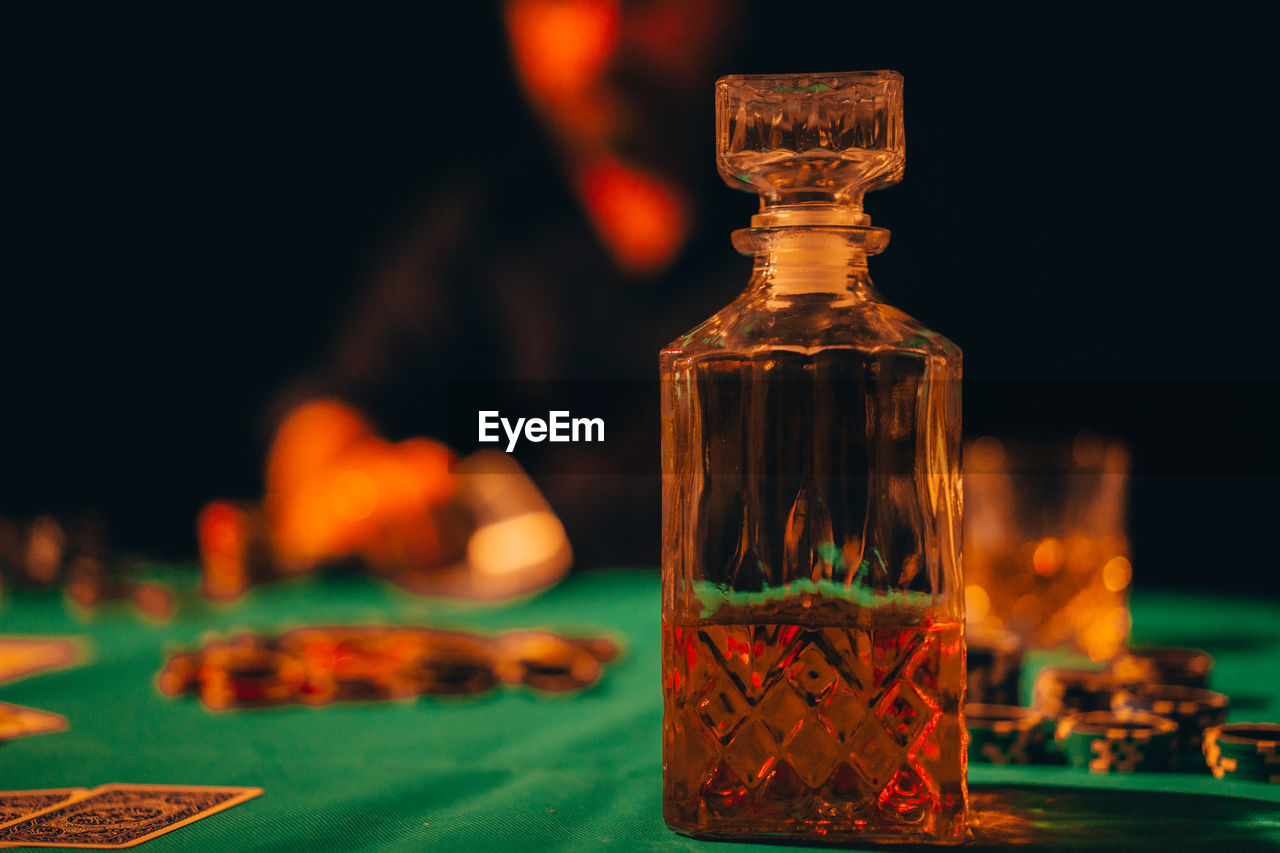 Close-up of glass bottles on table