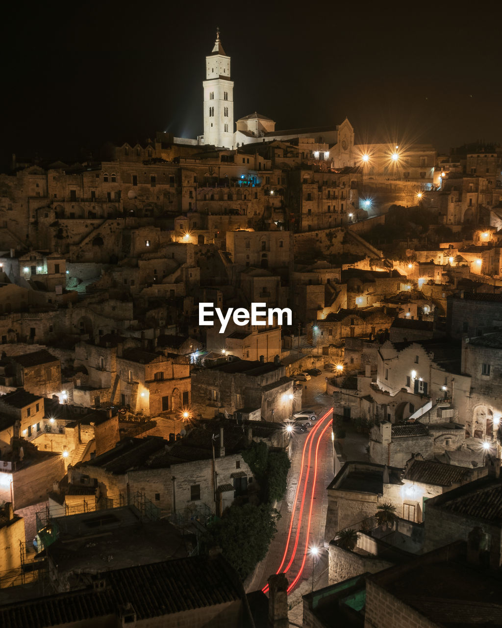 High angle view of illuminated buildings in city at night