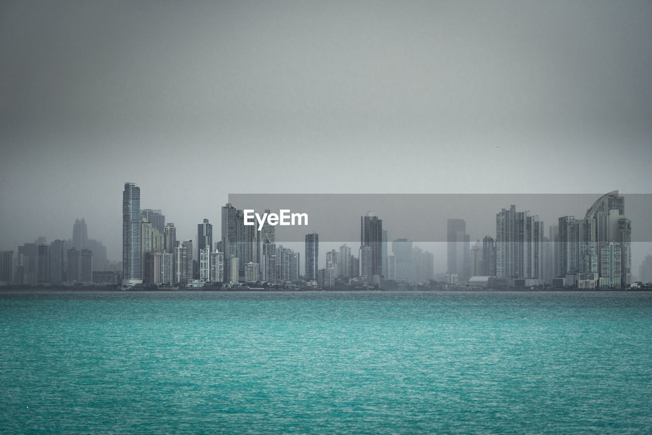 Skyline of panama city in a cloudy day seen from the water