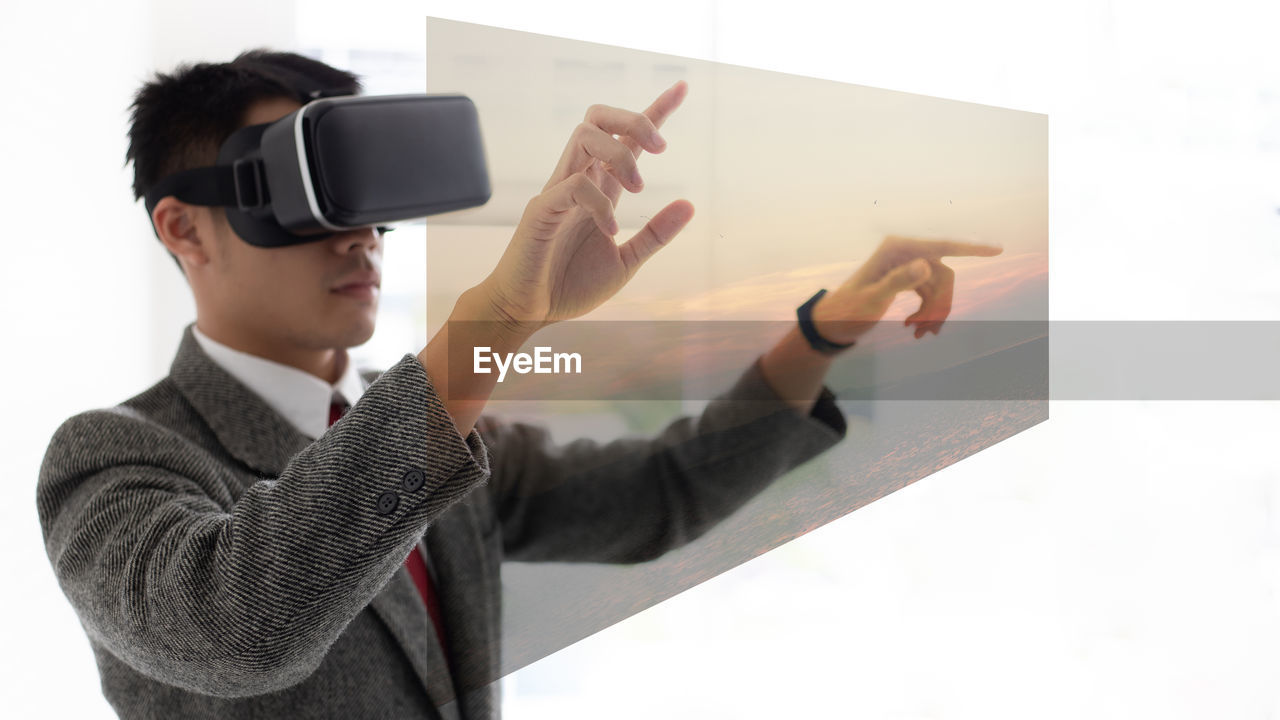 Businessman wearing virtual reality simulator