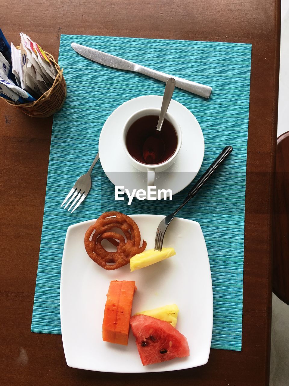 HIGH ANGLE VIEW OF COFFEE AND BREAKFAST ON TABLE