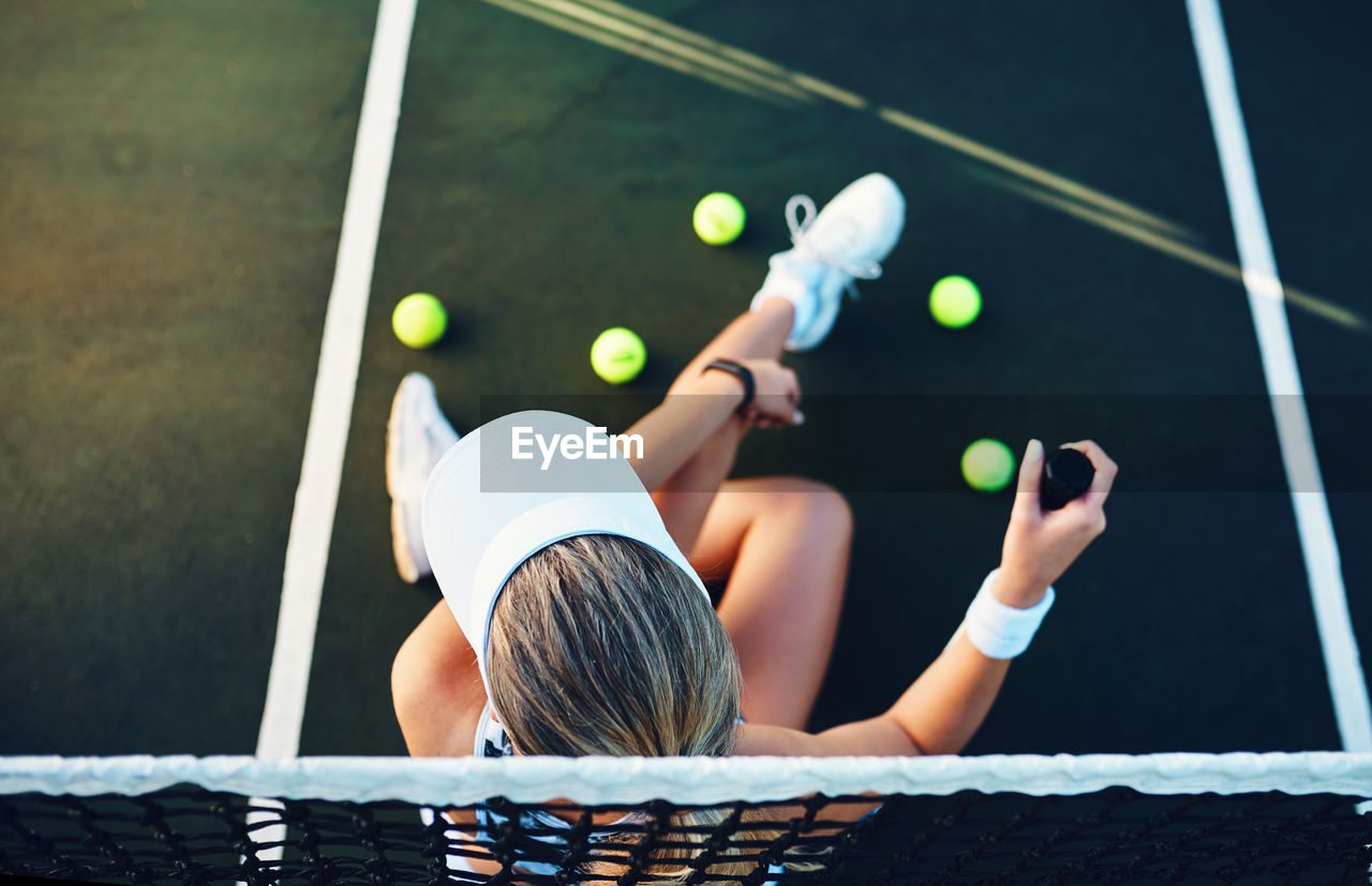 High angle view of woman playing soccer