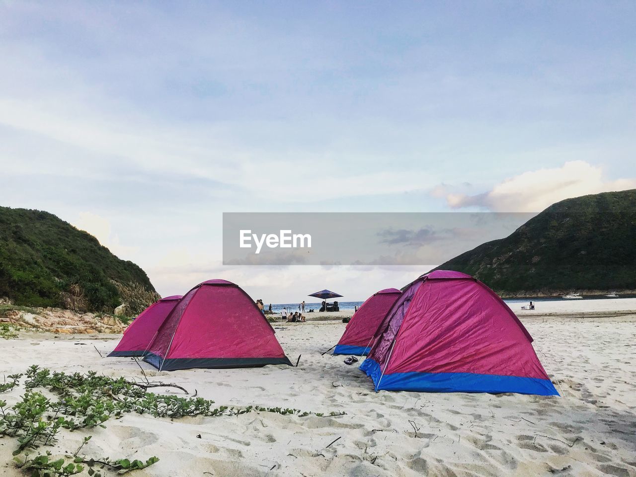 Tent on beach against sky