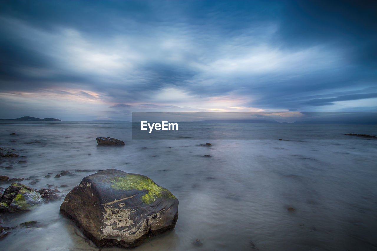 SCENIC VIEW OF SEA DURING SUNSET