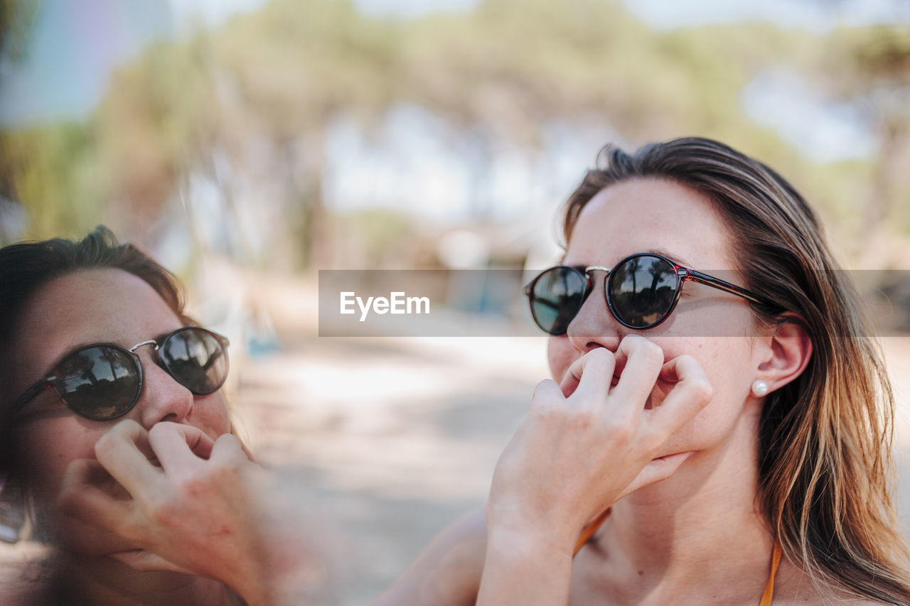 Young woman wearing sunglasses outdoors