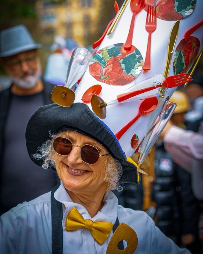 adult, men, portrait, celebration, hat, clothing, smiling, arts culture and entertainment, happiness, fashion accessory, carnival, person, festival, event, human face, emotion, glasses, one person, sunglasses, costume hat, outdoors, mature adult, costume, focus on foreground, senior adult