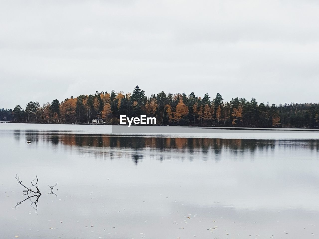 Scenic view of lake against sky during autumn