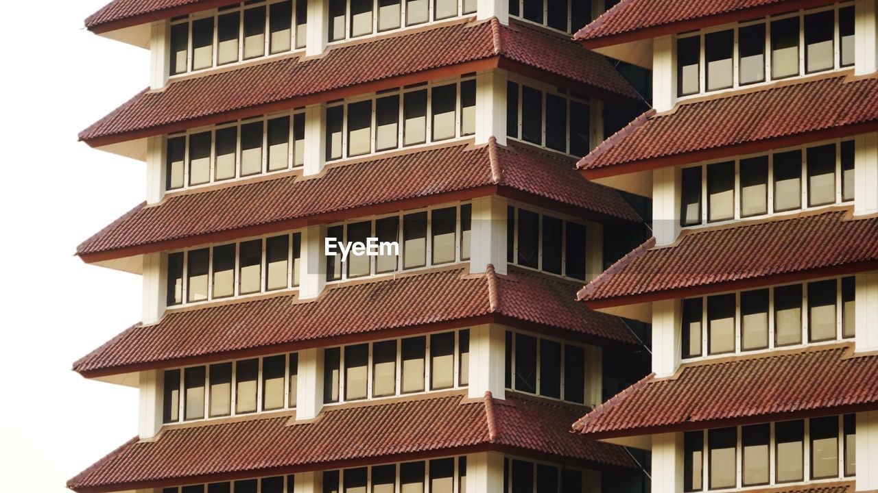 LOW ANGLE VIEW OF RESIDENTIAL BUILDING