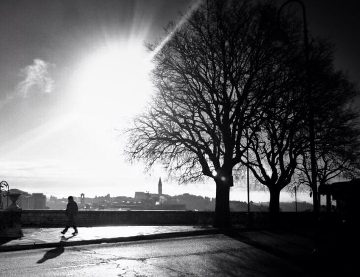 PEOPLE WALKING ON ROAD