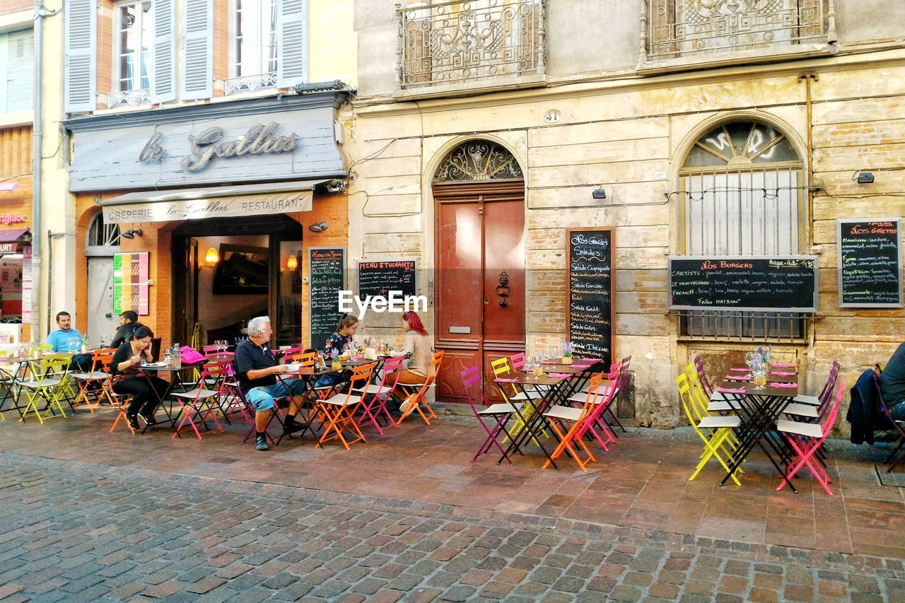 CHAIRS AND TABLES IN CAFE