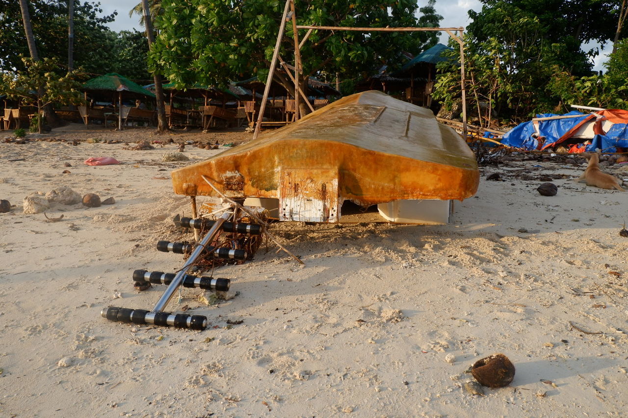 ABANDONED CART ON SAND