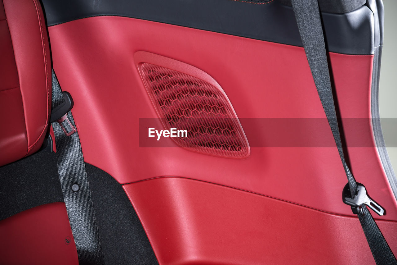 Close-up of red seats in car