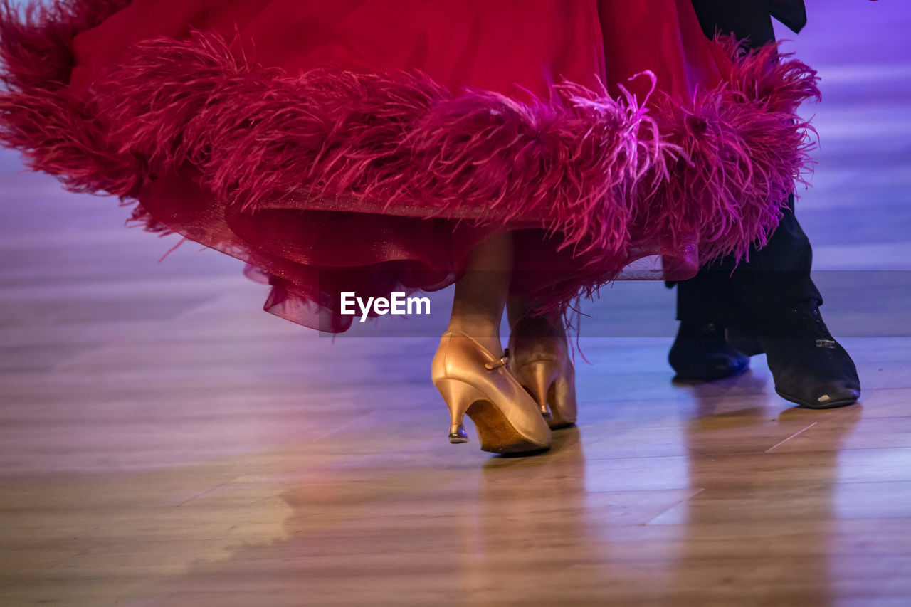 low section of woman standing on floor