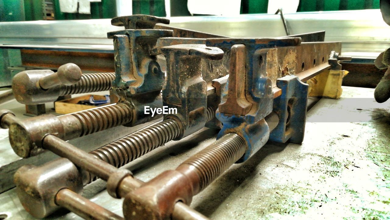 CLOSE-UP OF OLD MACHINE PART