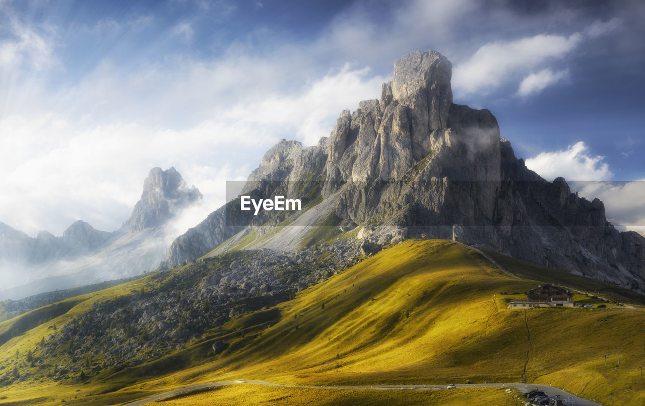 Scenic view of landscape and mountains against sky