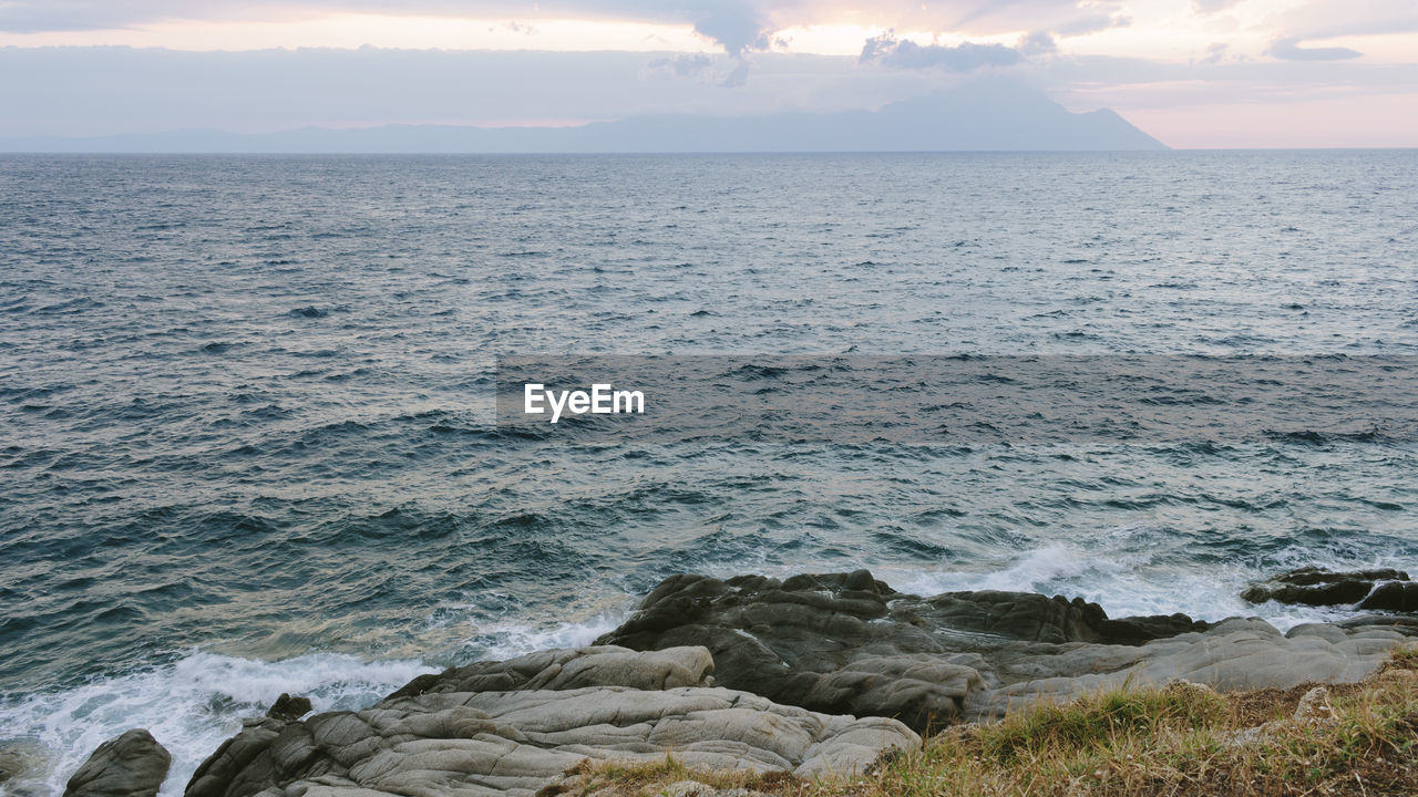 Scenic view of sea against sky during sunset